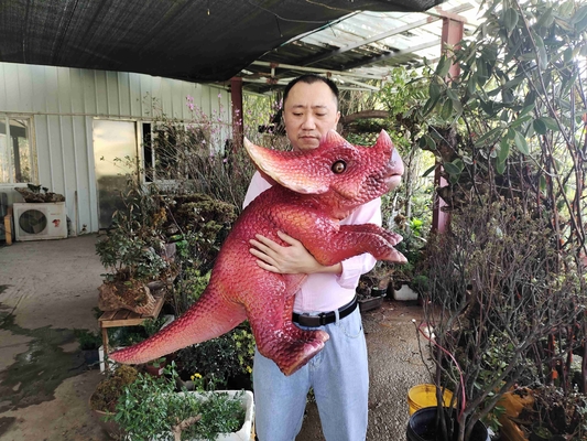 ซื้อ สีแดง Baby การปรับปรุง Dino มือตุ๊กตาสําหรับสวนสนุก online manufacture